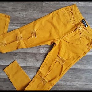 Yellow destroyed jeans